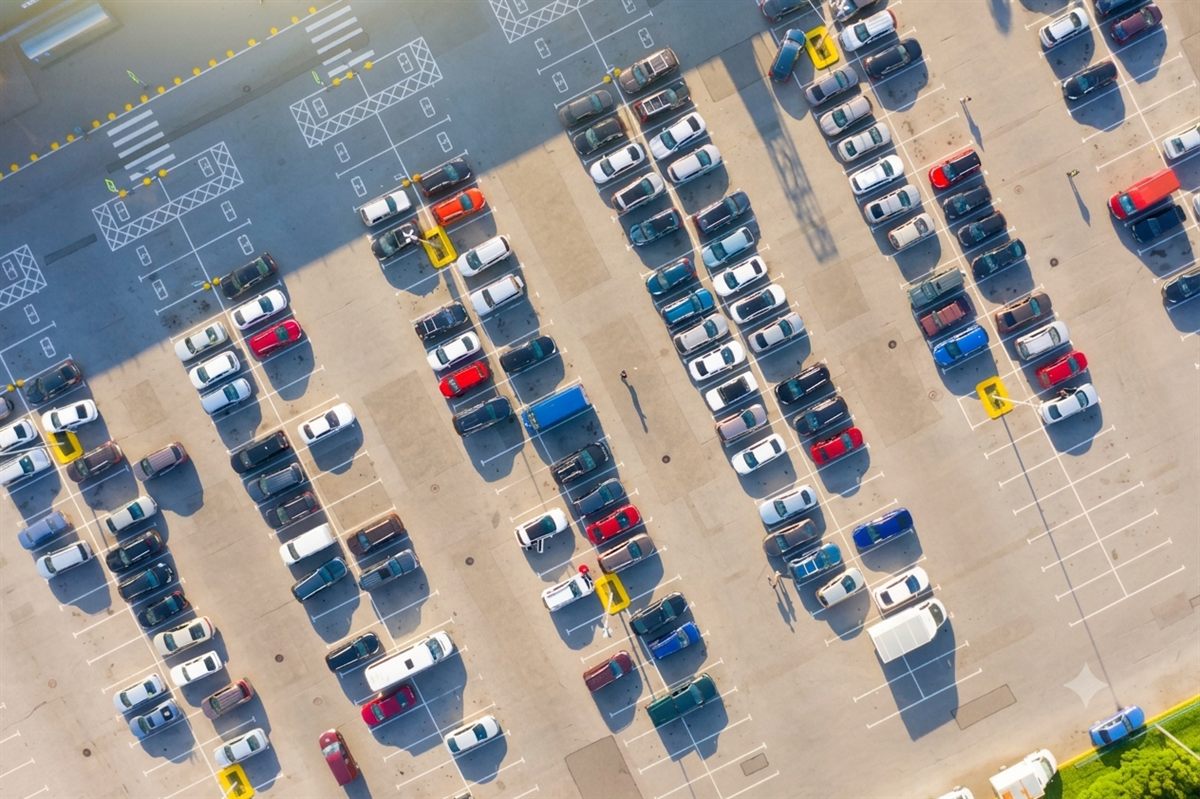 Aerial view of a packed rental car lot
