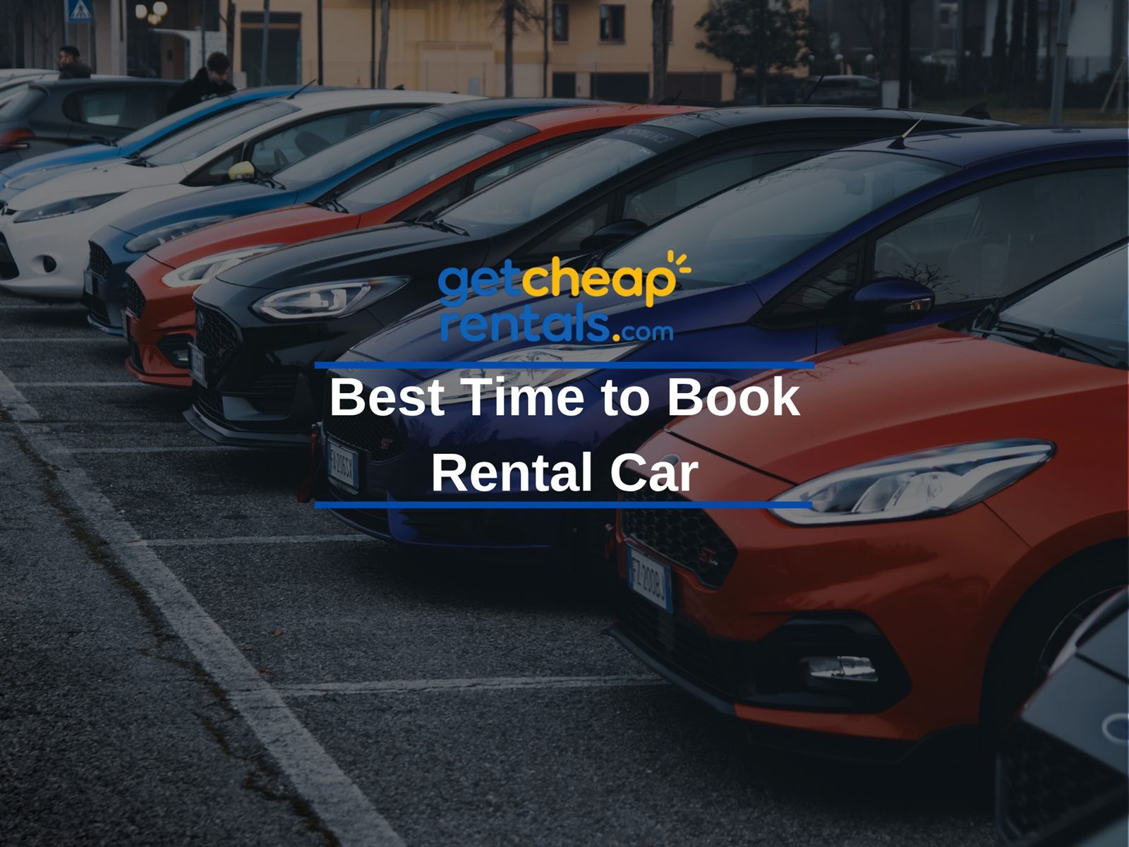 A row of rental cars parked in a lot — the best time to book a rental car